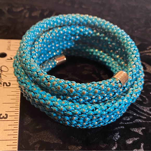Turquoise and gold toned wrap bracelet fits most wrists 1 3/4” by 2 1/2” across - Picture 2 of 6